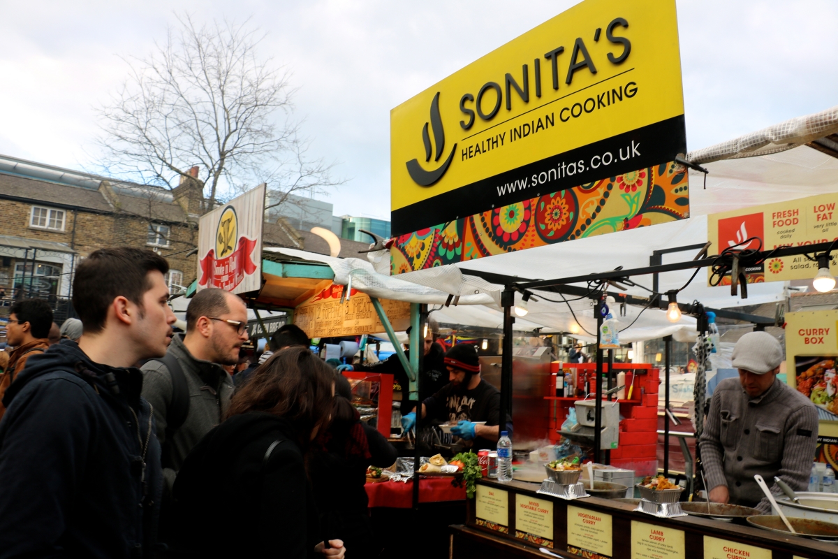 Crowded food stands    